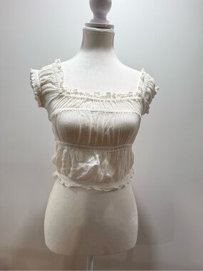 Smocked Ruffle Off the Shoulder Crop Top in Cream